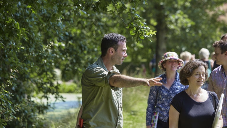 Visitors on a garden tour at Sissinghurst Castle Garden